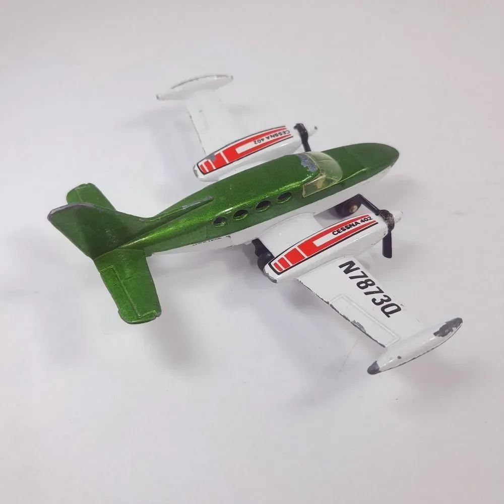 MATCHBOX Sky Busters 1974 SP9 Cessna 402 plane Airplane Macau Diecast green